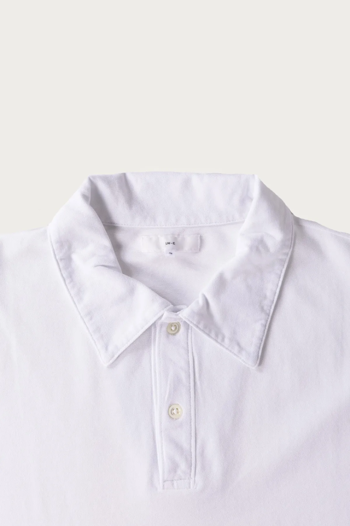 Lady White Co. Pique Two Button Polo - White< Shirts
